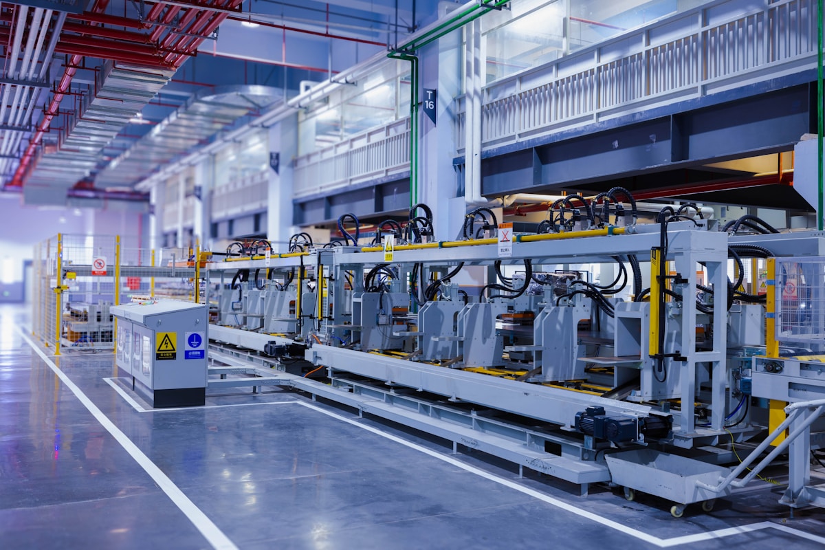 Fabrication bay layout supporting welded assemblies and kit packing.